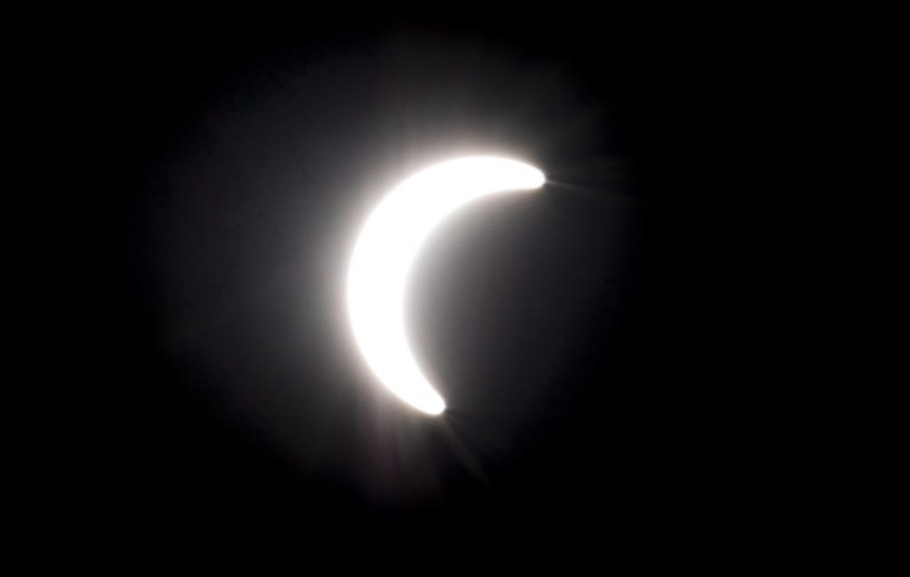 Eye experts and Canada's space agency are encouraging people to take in the rare solar eclipse happening on April 8, but only with proper eye protection. A partial solar eclipse is seen from North Vancouver, B.C. Monday, August 21, 2017. THE CANADIAN PRESS/Jonathan Hayward
