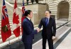 Conservative Leader Pierre Poilievre, right, shakes hands with Manitoba Premier Wab Kinew prior to a meeting at the legislature in Winnipeg on Thursday, March 28, 2024. THE CANADIAN PRESS/Steve Lambert