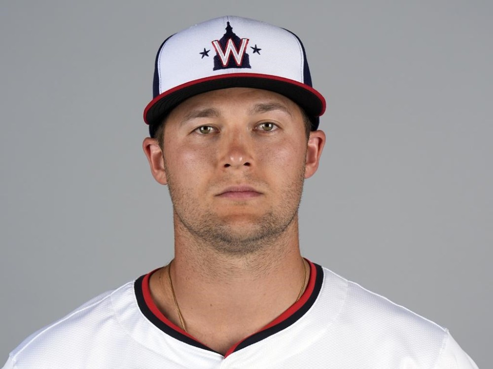 FILE - This is a 2024 photo of Nick Senzel of the Washington Nationals baseball team. Senzel was scratched from the opening day lineup after breaking his thumb during batting practice Thursday, March 28, 2024, manager Dave Martinez said. (AP Photo/Jeff Roberson, File)