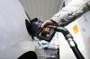 The national price on pollution will rise by $15 per tonne today for consumers, small and medium-sized businesses, First Nations, as well as public-sector operations such as hospitals, universities, schools and municipalities. A person pumps gas at a gas station in Mississauga, Ont., Tuesday, February 13, 2024. THE CANADIAN PRESS/Christopher Katsarov