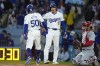 Los Angeles Dodgers' Mookie Betts (50) celebrates his home run with Shohei Ohtani (17) during the first inning of a baseball game against the St. Louis Cardinals Friday, March 29, 2024, in Los Angeles. (AP Photo/Jae C. Hong)