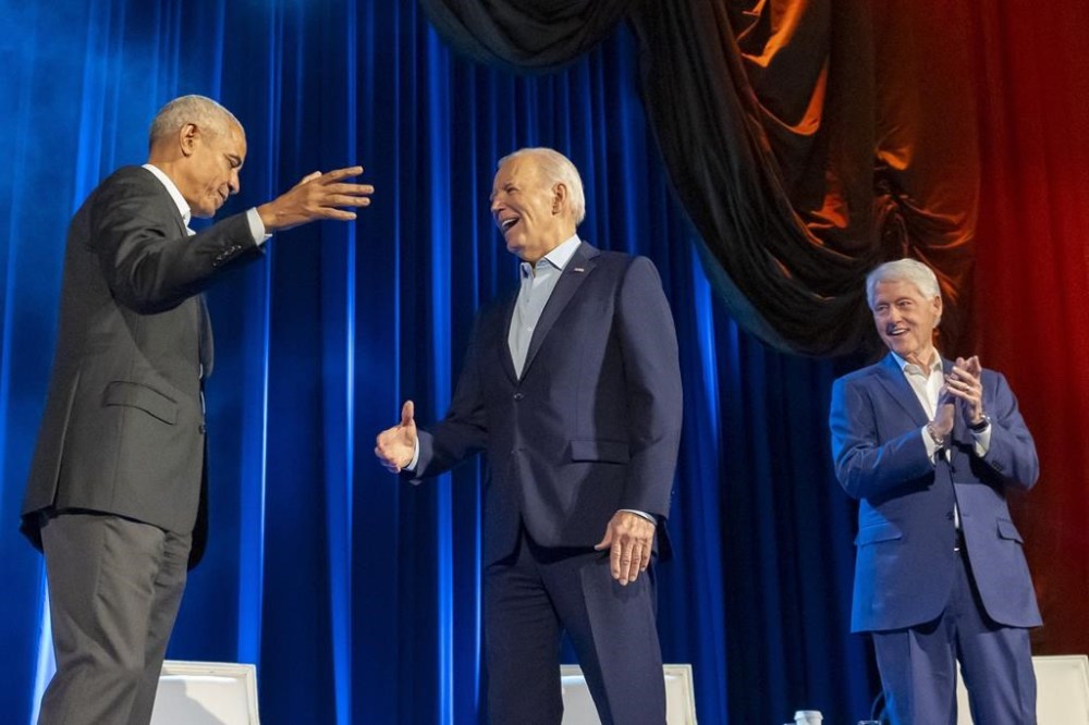 President Joe Biden, center, and former presidents Barack Obama and Bill Clinton participate in a fundraising event with Stephen Colbert at Radio City Music Hall, Thursday, March 28, 2024, in New York. (AP Photo/Alex Brandon)