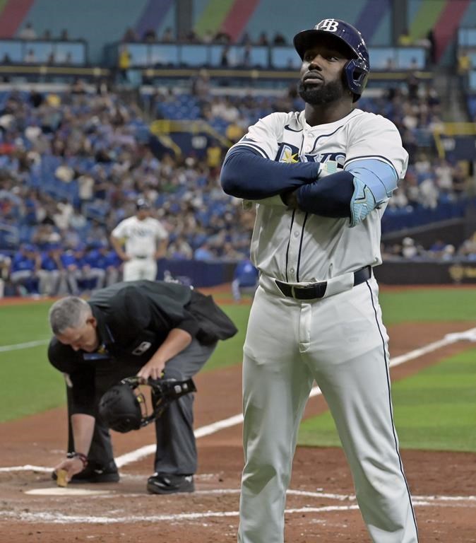 Tampa Bay Rays' Randy Arozarena celebrates his solo home run off Toronto Blue Jays starter Yusei Kikuchi during the fifth inning of a baseball game, Saturday, March 30, 2024, in St. Petersburg, Fla. (AP Photo/Steve Nesius)