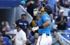 Miami Marlins right fielder Avisail Garcia reacts after hitting a solo home run against the Pittsburgh Pirates during the fourth inning of a baseball game Sunday, March 31, 2024, in Miami. (AP Photo/Rhona Wise)
