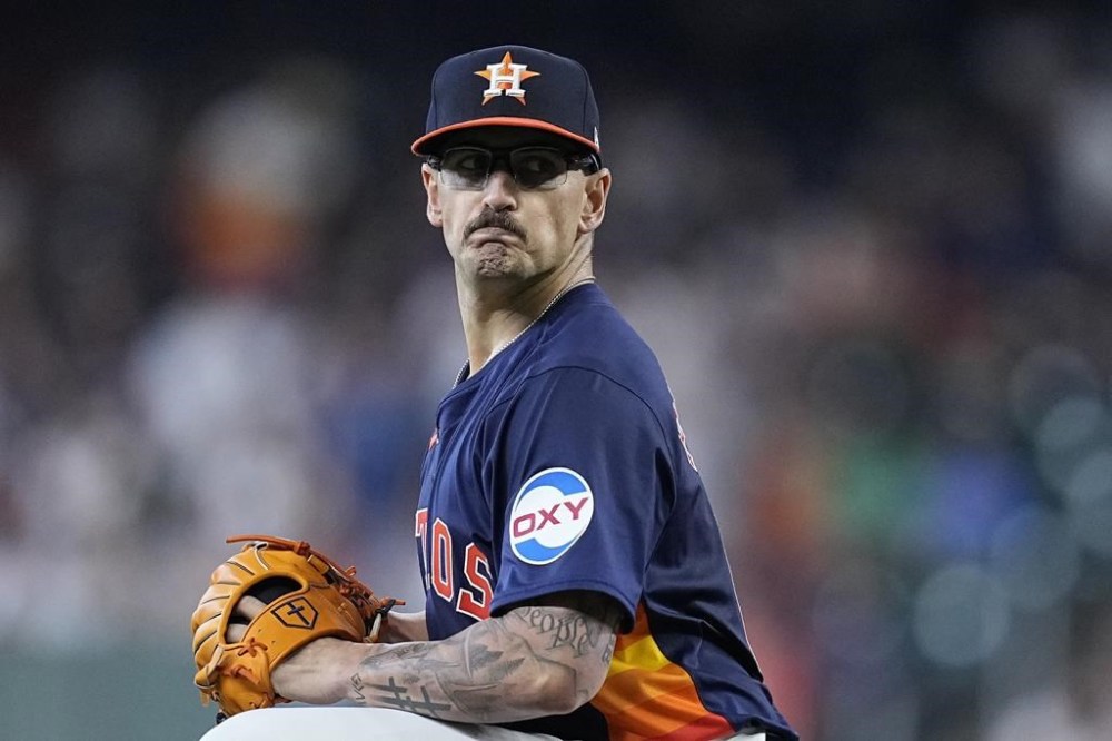 Houston Astros starting pitcher J.P. France winds up during the first inning of the team's baseball game against the New York Yankees, Sunday, March 31, 2024, in Houston. (AP Photo/Kevin M. Cox)