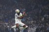 Marseille's Geoffrey Kondogbia heads the ball during the French League One soccer match between Marseille and Paris at the Velodrome stadium in Marseille, south of France, Sunday, March 31, 2024. (AP Photo/Daniel Cole)