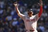 Boston Red Sox's Rafael Devers reacts to hitting a single against the Seattle Mariners during the first inning of a baseball game Sunday, March 31, 2024, in Seattle. (AP Photo/Lindsey Wasson)