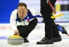 Italy's Joel Retornaz drew the four-foot ring in an extra end for a 7-6 victory over Canada's Brad Gushue on Monday at the world men's curling championship. Retornaz throws while taking on Canada at the Men's World Curling Championship in Ottawa on Saturday, April 1, 2023. THE CANADIAN PRESS/Sean Kilpatrick