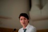Prime Minister Justin Trudeau says the upcoming federal budget will include a national school food program that will provide meals to children. Trudeau speaks at a press conference in Surrey, B.C., Thursday, March 28, 2024.THE CANADIAN PRESS/Tijana Martin