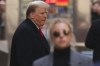 Former President Donald Trump departs 40 Wall Street after a news conference, Monday, March 25, 2024, in New York. A New York judge has scheduled an April 15 trial date in former President Donald Trump's hush money case. Judge Juan M. Merchan made the ruling Monday. (AP Photo/Yuki Iwamura)