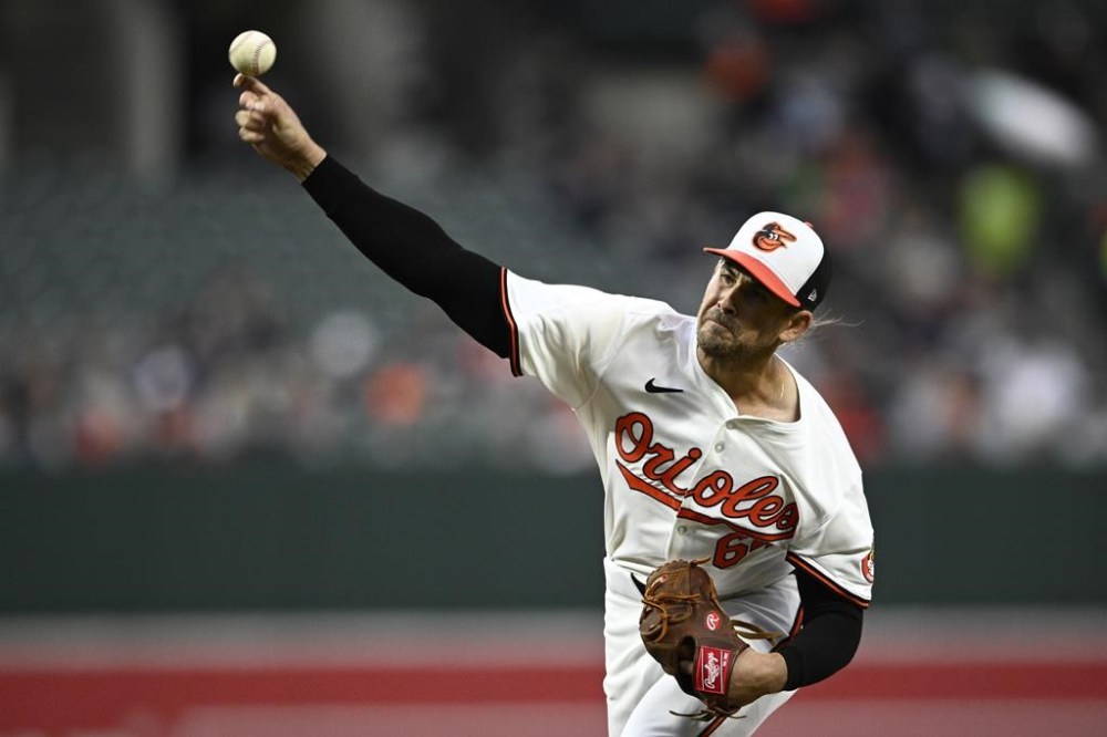 Baltimore Orioles starting pitcher Dean Kremer throws during the first inning of a baseball game against the Kansas City Royals, Monday, April 1, 2024, in Baltimore. (AP Photo/Nick Wass)