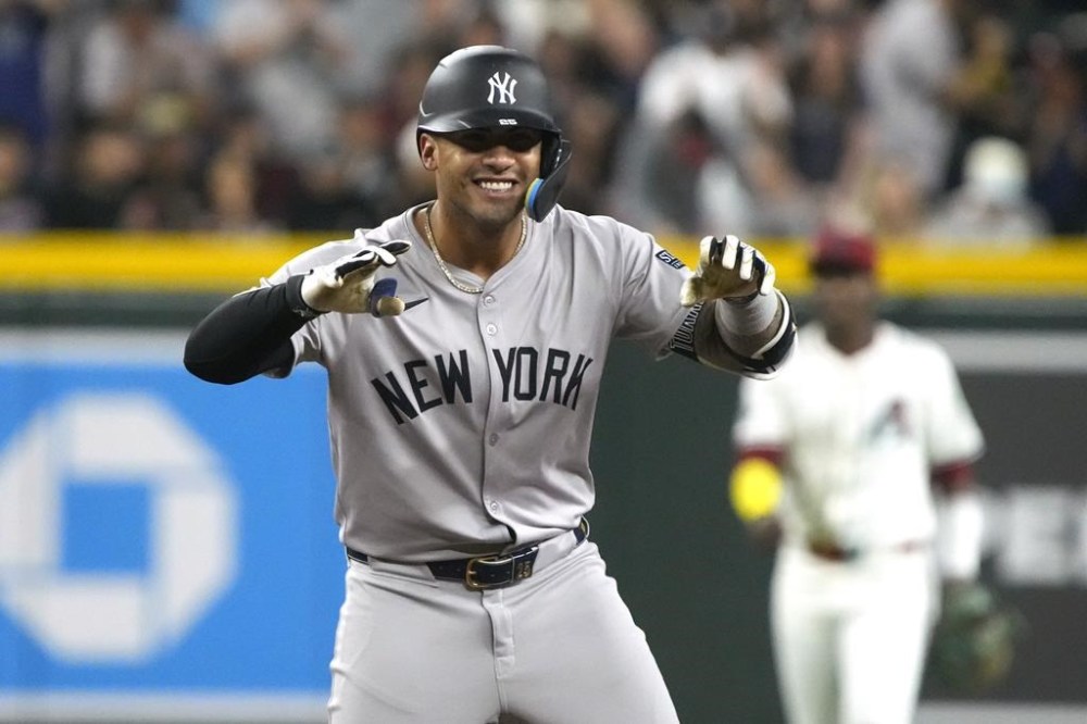 New York Yankees' Gleyber Torres reacts after hitting an RBI double against the Arizona Diamondbacks in the second inning during a baseball game, Monday, April 1, 2024, in Phoenix. (AP Photo/Rick Scuteri)