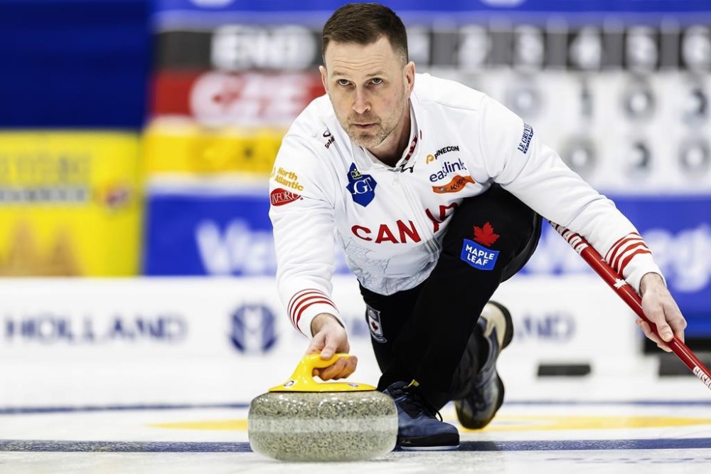 Canada's skip Brad Gushue delivers a stone against the Czech Republic at the men's Curling World Championships in Schaffhausen, Switzerland, Saturday, March 30, 2024. Gushue improved to 4-1 following a 7-4 win over New Zealand's Anton Hood at the world men's curling championship on Tuesday. THE CANADIAN PRESS/AP-Michael Buholzer/Keystone via AP