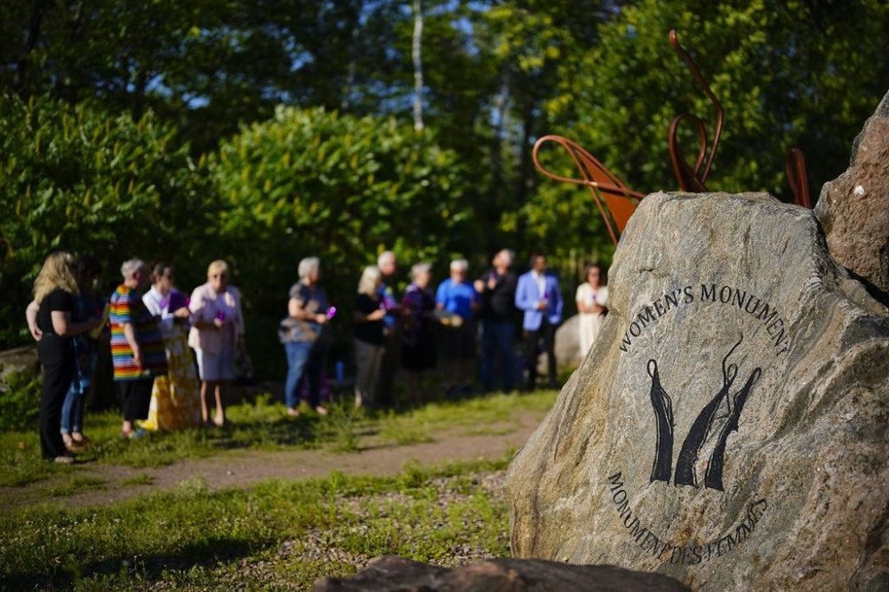 People take part in a vigil at the Women's Monument in Petawawa, Ont., following the jury's release of recommendations in the Borutski inquest in Pembroke, Ont., on Tuesday, June 28, 2022. Borutski, who was convicted in 2017 in the murders of three women in Renfrew County, died in prison last week of what officials say were natural causes. THE CANADIAN PRESS/Sean Kilpatrick