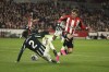 Brentford's Yehor Yarmolyuk, right vies for the ball with Manchester United's Victor Lindelof during the English Premier League soccer match between Brentford and Manchester United at the Gtech Community Stadium in London, Saturday, March 30, 2024. (AP Photo/Ian Walton)