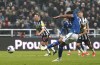 Everton's Dominic Calvert-Lewin scores his side's first goal from a penalty during the English Premier League soccer match between Newcastle United and Everton at St. James' Park, in Newcastle, England, Tuesday, April 2, 2024. (Owen Humphreys/PA via AP)