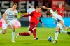 From left: Saarbrucken's Bjarne Thoelke, Kaiserslautern's Marlon Ritter and Saarbrucken's Manuel Zeitz challenge for the ball during the German Soccer Cup semifinal soccer match between 1. FC Saarbrucken and 1. FC Kaiserslautern at Ludwigspark Stadium in Saarbrucken, Germany, Tuesday, April 2, 2024. (Uwe Anspach/dpa via AP)