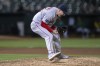 Boston Red Sox relief pitcher Josh Winckowski celebrates a save to win the game in the 11th inning of a baseball game against the Oakland Athletics, Tuesday, April 2, 2024, in Oakland, Calif. (AP Photo/Nic Coury)