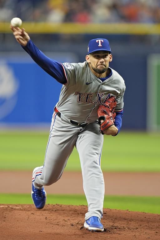 Texas Rangers' Nathan Eovaldi pitches to the Tampa Bay Rays during the first inning of a baseball game Wednesday, April 3, 2024, in St. Petersburg, Fla. (AP Photo/Chris O'Meara)