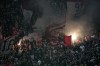 Duesseldorf fans cheer their team during the German soccer cup match between Bayer 04 Leverkusen and Fortuna Duesseldorf in Leverkusen, Germany, April 3, 2024. (AP Photo/Martin Meissner)
