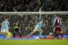 Manchester City's Phil Foden runs as he celebrates after scoring his third goal of the match during the English Premier League soccer match between Manchester City and Aston Villa at the Etihad Stadium in Manchester, England, Wednesday, April 3, 2024. (AP Photo/Dave Thompson)