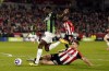 Brighton and Hove Albion's Danny Welbeck shoots the ball during the English Premier League soccer match between Brentford and Brighton and Hove Albion at the Gtech Community Stadium, London, Wednesday, April 3, 2024. (Andrew Matthews/PA via AP)