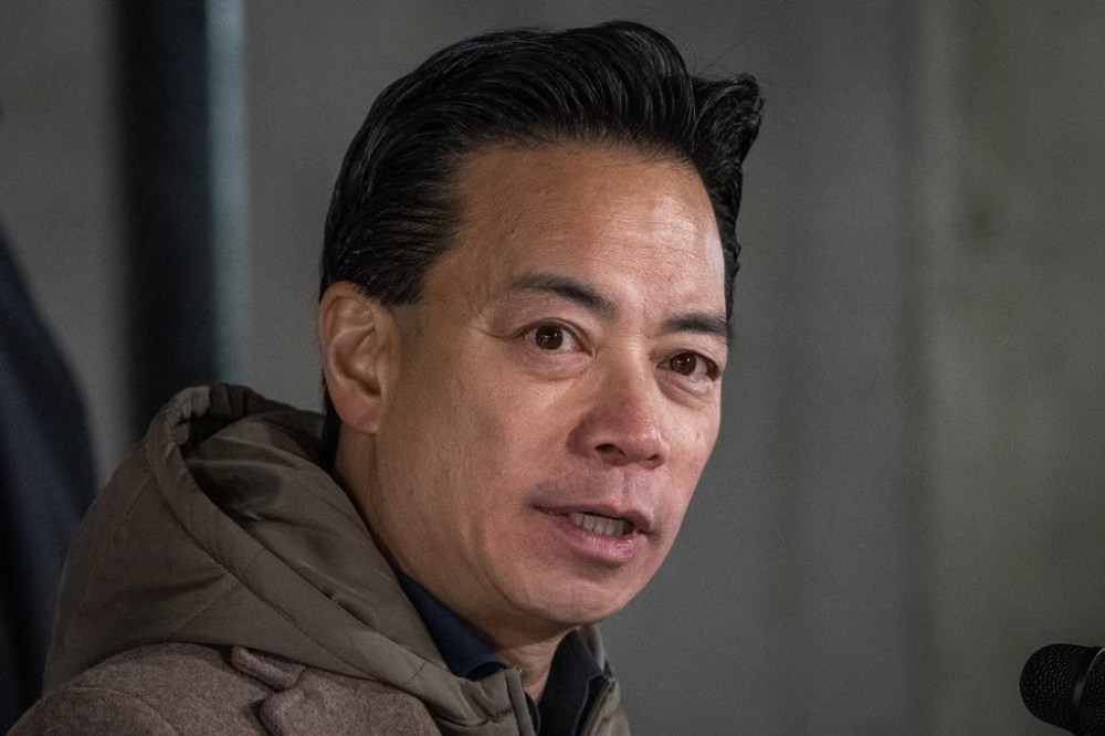 Vancouver Mayor Ken Sim speaks during a news conference in Vancouver, B.C., Friday, Dec. 15, 2023. The mayor of Vancouver says the city is disappointed about the new location of an overdose prevention site in the downtown core. THE CANADIAN PRESS/Ethan Cairns