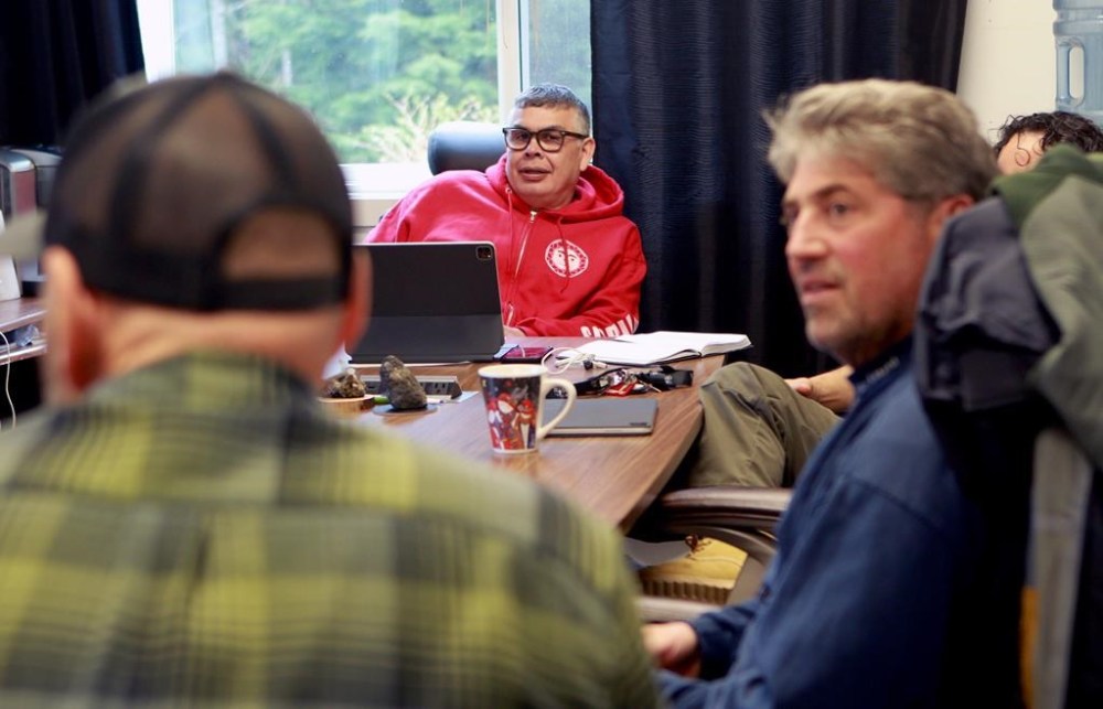 Ehattesaht First Nation Chief Simon John is joined by fellow council members and Fisheries Department Pacific region marine mammal co-ordinator Paul Cottrell, right, during a meeting at their band office in Zeballos, B.C., about an orphaned killer whale calf on Wednesday, April 3, 2024. THE CANADIAN PRESS/Chad Hipolito