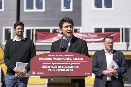 Prime Minister Justin Trudeau, centre, with Minister of Housing, Infrastructure and Communities Sean Fraser, left, while making a housing announcement in Dartmouth, N.S. on Tuesday. (Darren Calabrese / The Canadian Press files)