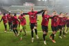 Leverkusen's Granit Xhaka celebrates with team mates after the German soccer cup match between Bayer 04 Leverkusen and Fortuna Duesseldorf in Leverkusen, Germany, April 3, 2024. (AP Photo/Martin Meissner)
