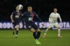 PSG's Kylian Mbappe controls the ball during the French Cup semifinal soccer match between Paris Saint-Germain and Rennes at the Parc des Princes stadium in Paris, France, Wednesday, April 3, 2024. (AP Photo/Thibault Camus)