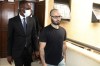 Tigran Gambaryan, an American citizen and Binance's head of financial crime compliance, right, is escorted as he leaves a court hearing at the federal High Courts, in Abuja, Nigeria, Thursday, April 4, 2024. Nigerian authorities have asked a local court to prosecute Binance and two of its executives for alleged money laundering and tax evasion. The request was made on Thursday at the high court in the capital of Abuja where one of the executives, Gambaryan, was produced in court while the second remains at large after recently fleeing custody. (AP Photo/Olamikan Gbemiga )