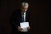 NDP MP Charlie Angus makes his way to the podium for a news conference, Tuesday, Oct. 17, 2023 in Ottawa. Angus has announced he will not run in next federal election, marking the end of a 20-year career in Parliament.THE CANADIAN PRESS/Adrian Wyld