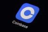 Canadian regulators have cleared crypto-trading platform Coinbase to do business in the country as a restricted dealer. The Coinbase app icon is seen on a smartphone, Tuesday, Feb. 28, 2023, in Marple Township, Pa. THE CANADIAN PRESS/AP-Matt Slocum