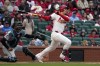 St. Louis Cardinals' Nolan Gorman follows through on a two-run double during the seventh inning of a baseball game against the Miami Marlins Thursday, April 4, 2024, in St. Louis. (AP Photo/Jeff Roberson)