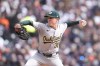 Oakland Athletics pitcher JP Sears throws during the second inning of a baseball game against the Detroit Tigers, Friday, April 5, 2024, in Detroit. (AP Photo/Carlos Osorio)