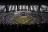 A giant American flag is unfurled before the start of the home-opener baseball game at Yankee Stadium between the New York Yankees and the Toronto Blue Jays, Friday, April 5, 2024, in New York. (AP Photo/Seth Wenig)