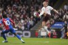 Manchester City's Erling Haaland, right, and Crystal Palace's Eberechi Eze challenge for the ball during the English Premier League soccer match between Crystal Palace and Manchester City at Selhurst Park stadium in London, Saturday, April 6, 2024.(AP Photo/Frank Augstein)