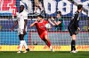 Heidenheim's Kevin Sessa, center, celebrates their side's first goal of the game during the German Bundesliga soccer match between Bayern Munich and 1. FC Heidenheim at Voith-Arena stadium, in Heidenheim, Germany, Saturday, April 6, 2024. (Tom Weller/dpa via AP)