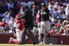 Miami Marlins' Avisaíl García, right, argues with home plate umpire Jeremie Rehak during the ninth inning of a baseball game against the St. Louis Cardinals Saturday, April 6, 2024, in St. Louis. (AP Photo/Jeff Roberson)