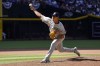 New York Yankees pitcher Jonathan Loáisiga throws against the Arizona Diamondbacks in the ninth inning during a baseball game, Wednesday, April 3, 2024, in Phoenix. Loáisiga said he needs season-ending elbow surgery and will be sidelined for 10-to-12 months. The29-year-old right-hander, said he felt a pop in his elbow while throwing a changeup to Jorge Barrosa, his final batter in the ninth inning of Wednesday's 6-5, 11-inning win at Arizona. (AP Photo/Rick Scuteri)