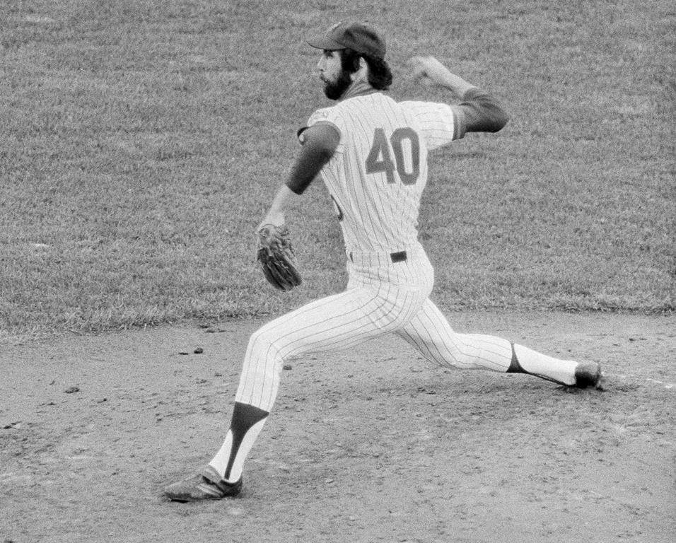 FILE - New York Mets right hand hurler Pat Zachry throws during a baseball game against the Philadelphia Phillies at New York's Shea Stadium, July 4, 1978. Zachry, who won a share of the 1976 National League Rookie of the Year for the World Series champion Cincinnati Reds and was traded to the New York Mets the following year for Tom Seaver, died Thursday, April 4, 2024, at his son's home in Austin, Texas, following a lengthy illness, Mets spokesman Jay Horwitz said Saturday, April 6, 2024. He was 71. (AP Photo/Richard Drew, File)