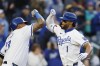 Kansas City Royals' MJ Melendez (1) is congratulated by Salvador Perez (13) after hitting a two-run home run against the Chicago White Sox during the seventh inning of a baseball game in Kansas City, Mo., Saturday, April 6, 2024. (AP Photo/Colin E. Braley)