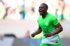 Wolfsburg's Ridle Baku celebrates scoring their side's first goal of the game during the German Bundesliga soccer match between Borussia Monchengladbach and Wolfsburg at the Volkswagen Arena in Wolfsburg, Germany, Sunday April 7, 2024. (Swen Pförtner/dpa via AP)