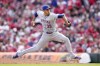 New York Mets pitcher Edwin Díaz throws during the ninth inning of a baseball game against the Cincinnati Reds, Sunday, April 7, 2024, in Cincinnati. (AP Photo/Jeff Dean)