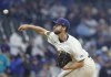 Milwaukee Brewers pitcher Colin Rea throws against the Seattle Mariners during the first inning of a baseball game Sunday, April 7, 2024, in Milwaukee. (AP Photo/Jeffrey Phelps)
