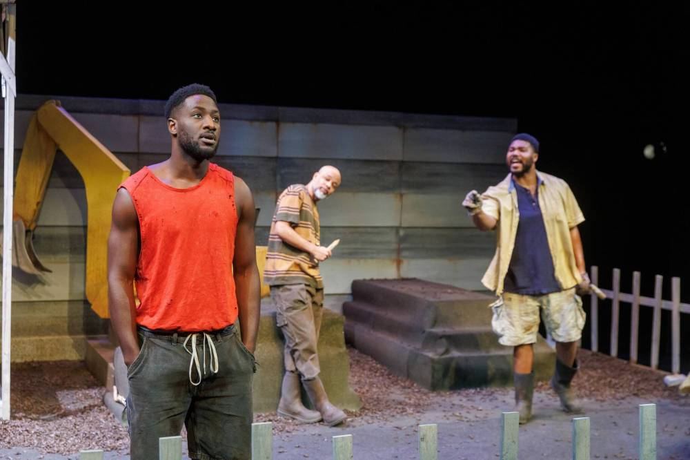 MIKE DEAL / FREE PRESS
                                The characters in Diggers — labourers in Sierra Leone — are all dreaming of a better life.