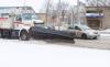 Snow-clearing trucks head north on Donald Street after an overnight storm last week. (Mike Deal / Free Press files)
