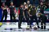 Darryl Dyck / THE CANADIAN PRESS
                                Ontario&rsquo;s David Mathers (left) and Manitoba&rsquo;s Reid Carruthers (centre), watch Sunday as an official measures to determine whose rock is closer to the button after the 11th end of their match during the Brier, in Regina.