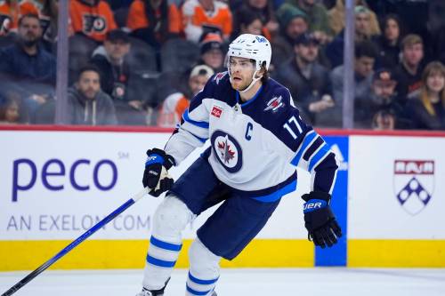 MATT SLOCUM / THE ASSOCIATED PRESS FILES
                                Winnipeg Jets captain Adam Lowry is on pace this season to eclipse his personal best for points.